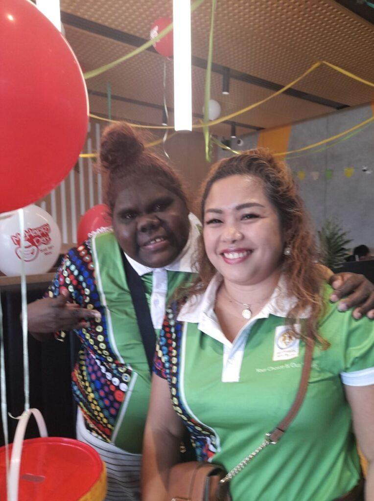 Support worker and participant during a McHappy day for people with disability.